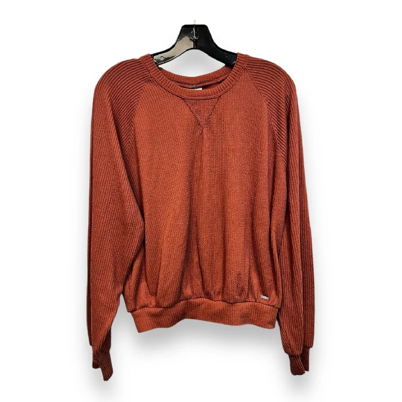 Top Long Sleeve By Hollister In Coral, Size: M